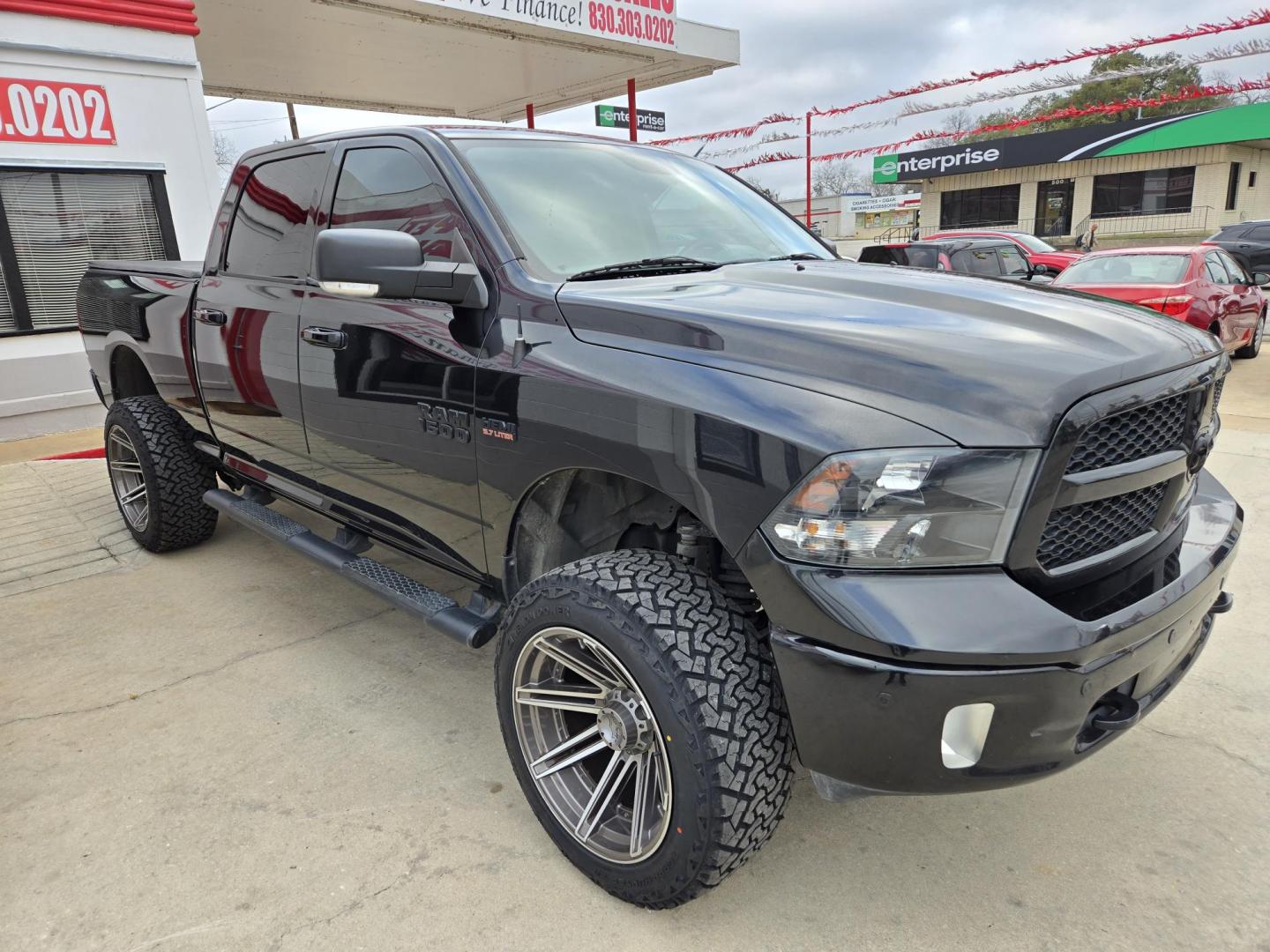 2018 Black RAM 1500 SLT Crew Cab LWB 4WD (1C6RR7TT4JS) with an 5.7L V8 OHV 16V engine, 8A transmission, located at 503 West Court, Seguin, TX, 78155, (830) 379-3373, 29.568621, -97.969803 - 2018 RAM 1500 SLT Crew Cab LWB 4WD with a 5.7L V8 OHV 16V, Automatic, Tilt, Cruise, AM/FM Touchscreen Stereo, Power Windows, Locks, Seat and Side Mirrors, Bluetooth, Tinted Windows, Automatic Headlights, Alloy Wheels, Backup Camera, Bumper Sensors, Running Boards, and more!! - Photo#1